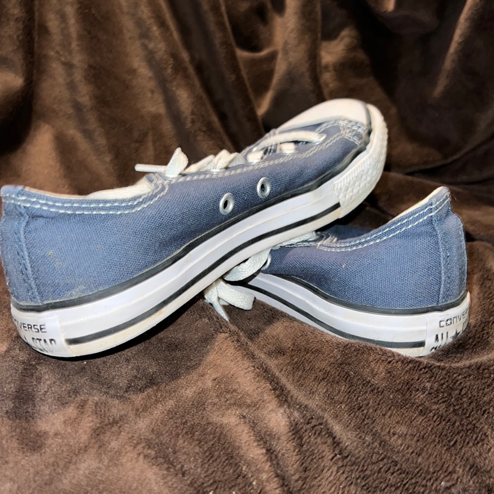 Youth converse. Denim colored blue. Used but in good condition.